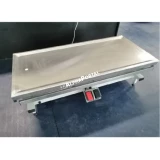 TSV Basic műtőasztal 60x130x45/105 cm -orvosi festékkel porfestett acélváz, motorosan emelhető